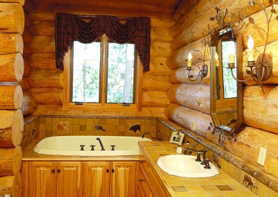 Log Home Bathroom With Wood Detail