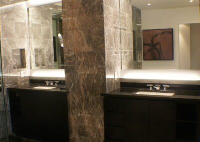 Beautiful Stone Walls Bathroom With Split Vanities