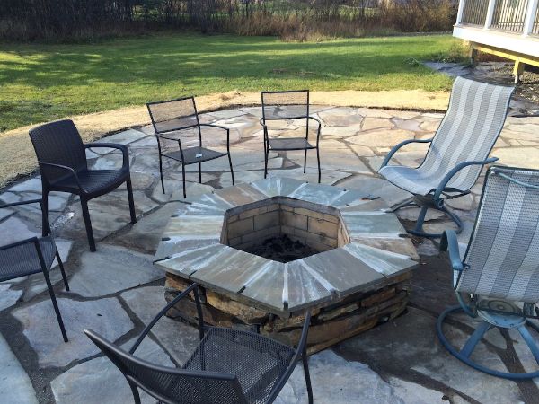 Custom Stone Patio And Firepit