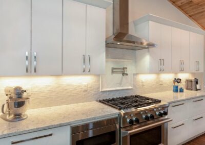 White Cabinets And White Stone Kitchen Remodel